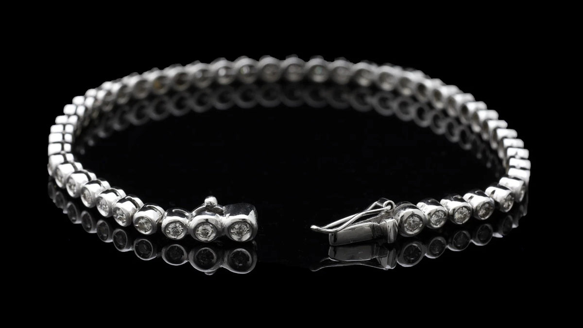 BRACCIALE TENNIS IN ORO BIANCO 18KT 750